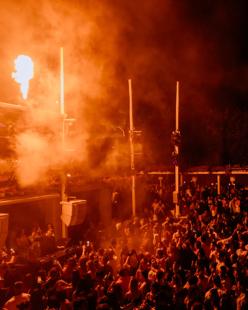Aerial view of the Island dance floor under pyrotechnic light