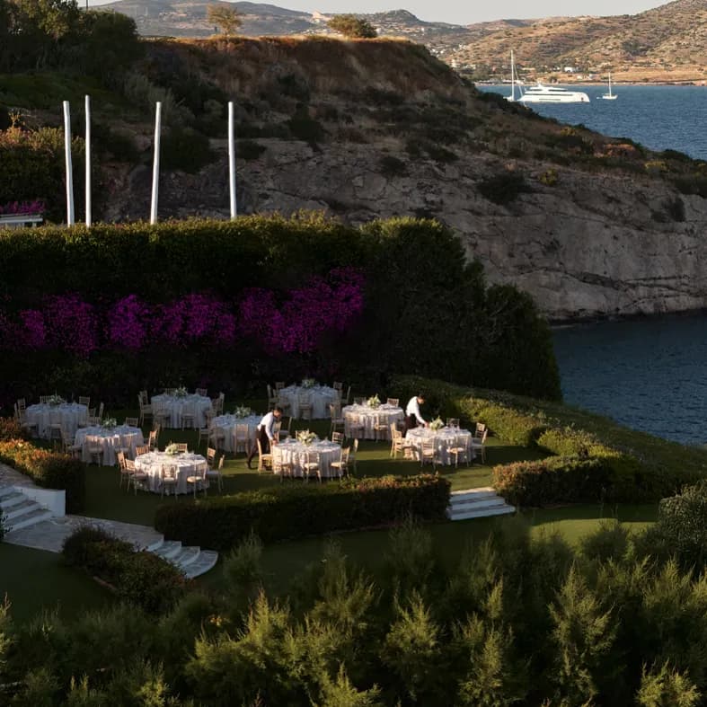 Lantern-lit Gallery lawn overlooking the sea