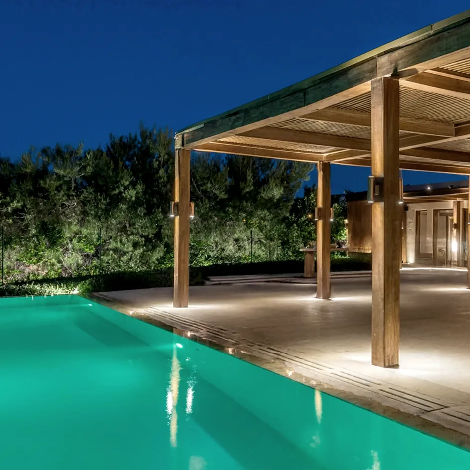 Private House pool terrace glowing at night