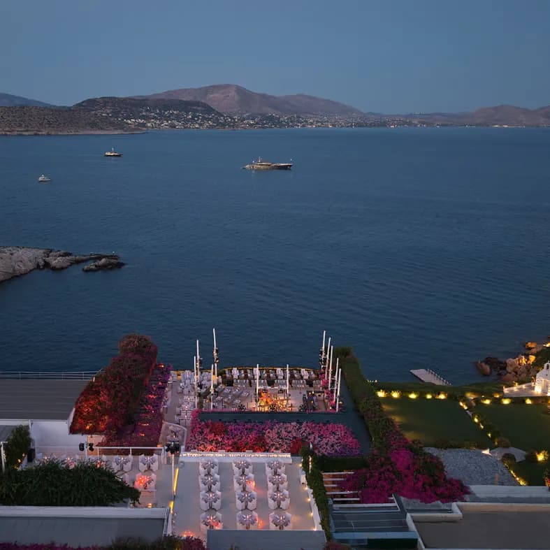 Aerial view of seaside event terraces at dusk
