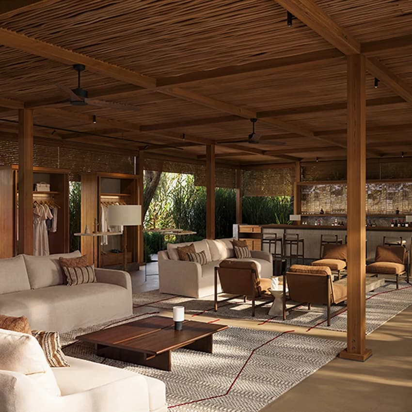 The Cabanas lounge with sofas, a wooden ceiling, and a bar