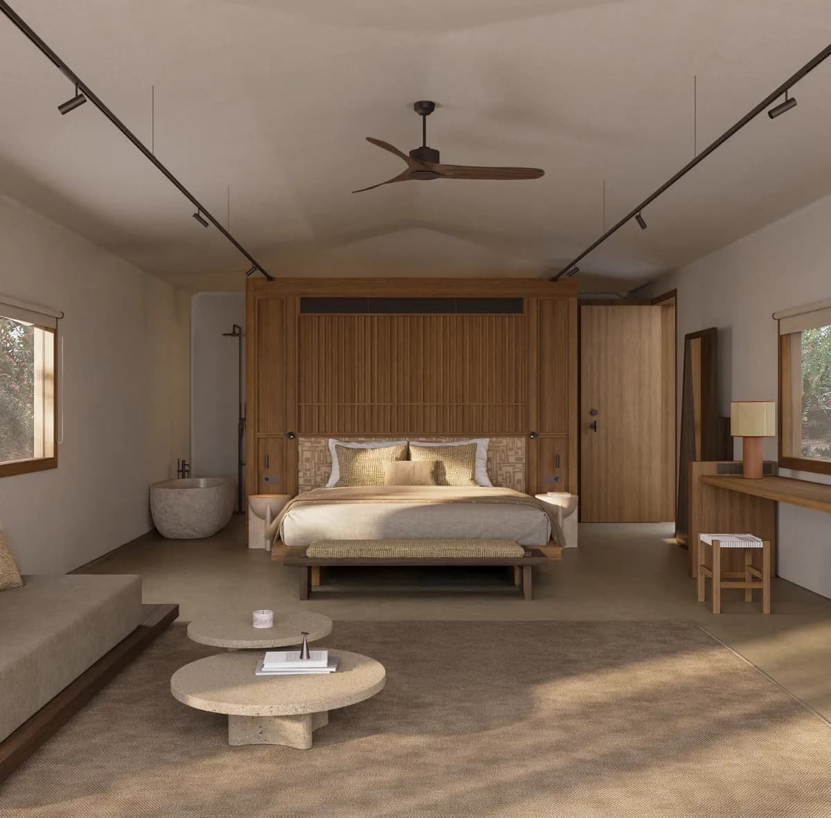 The Cabanas bedroom with a wooden headboard and stone bathtub