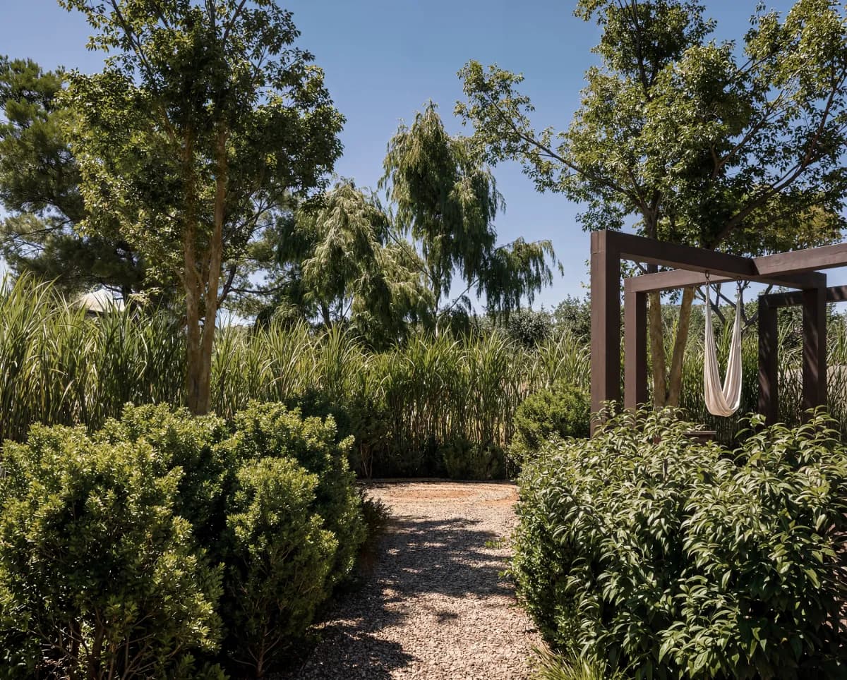 A tranquil garden path at The Cabanas