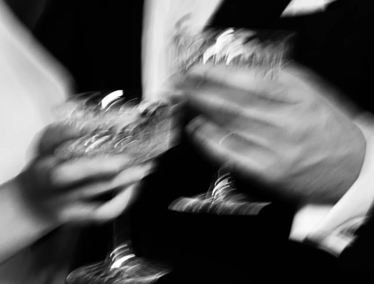 A blurred black-and-white moment of dining
