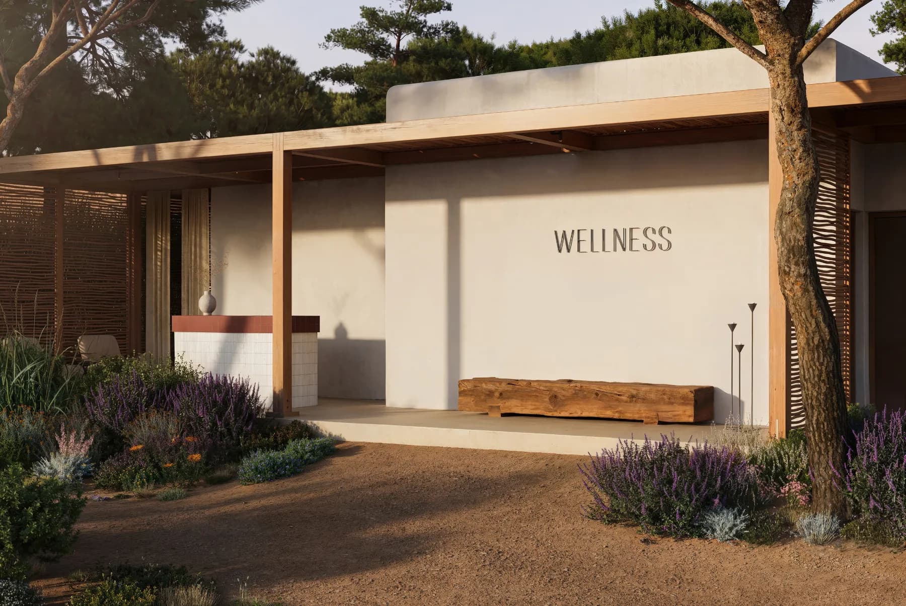 The wellness building surrounded by Mediterranean landscaping
